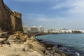 A view across the Islet of the English along the causeway towards the shoreline of Arrecife, Lanzarote