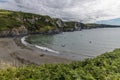 A view across an isolated cove and beach at low tide in north Pembrokeshire, Wales