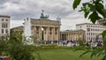 Unique view of the Brandenburg Gate with lots of Tourist in Berlin Germany.