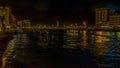 A view across the low reaches of the Dubai Creek at night in Dubai, UAE Royalty Free Stock Photo