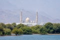 View across mangroves to Kalba Mosque in Sharjah, United Arab Emirates