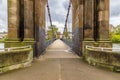 A view across the Portland Street Suspension Bridge in Glasgow Royalty Free Stock Photo