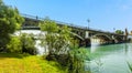 A view across the river Guadalquivir towards the Triana Bridge in Seville, Spain