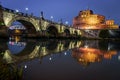 View across the river tiber of the St. Angelo Bridge to the fortress of Castel Sant'Angelo in Rome Italy