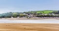 A view across the river Towy estuary at Llansteffan, Wales towards the coastal village of Ferryside Royalty Free Stock Photo