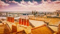 View across the roof tops and chimneys of Ramsgate town, Kent, UK, towards the Royal Harbour and the English Channel