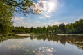 A view across a small lake in rural lancashire on a clear sunny Royalty Free Stock Photo