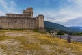 A view across the summit of Mount Subasio towards the Castle Rocca Maggiore above the town of Assisi, Umbria Royalty Free Stock Photo