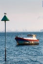 View across the Thames estuary with a moored boat