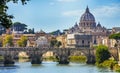 View across the Tiber to St. Peter`s Basilica from the Angel Bridge in Rome Lazio