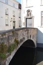 Backstreets of Bruges. View across the Tower Bridge (Torenbrug) Royalty Free Stock Photo