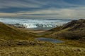 View across the valley and the lake towards the massive glacier front, Kangerlussuaq, Greenland Royalty Free Stock Photo