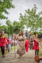 View of actors dressed in medieval clothes on medieval market, blurred background