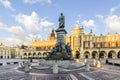 Adam Mickiewicz monument and cloth hall at sunrise, Krakow main Square, Old Town, Krakow, Poland Royalty Free Stock Photo