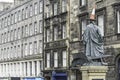 View of Adam Smith statue in Royal Mile street Edinburgh