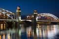 View of the adjustable part of the Bolsheokhtinsky bridge (Peter the Great) summer night. St. Petersburg Royalty Free Stock Photo