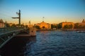 The historical center of St. Petersburg. Russia. View of the Admiralty building. Visible Palace bridge, the Hermitage. Sunset.