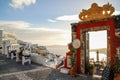 View of the Aegean Sea on the island of Santorini and the entrance to the famous cocktail bar Palia Kameni