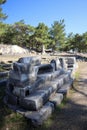 View of agora in ancient town Priene in Turkey with fragments of marble columns