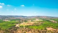 View of agriculture fields and forest with mountain in the background Royalty Free Stock Photo