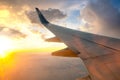 View from airplane on the aircraft white wing flying over desert landscape in sunny morning. Air travel and transportation concept Royalty Free Stock Photo