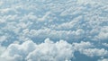 View from the airplane. Clouds at a height of several kilometers