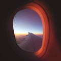 View From Airplane Window at Beautiful Sunrise. Luxery Travel Plane Concept. Royalty Free Stock Photo