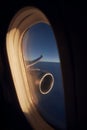 View from airplane window during flight above clouds Royalty Free Stock Photo