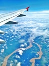 View from an airplane window during a flight over a river in the Amazon region. Royalty Free Stock Photo