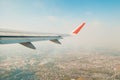 View from airplane window. Flying over the city Royalty Free Stock Photo