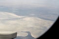 View from airplane window at high altitude, turbines about Africa Royalty Free Stock Photo
