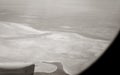 View from airplane window at high altitude, turbines about Africa Royalty Free Stock Photo