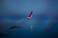 View from airplane window with night sky and white clouds. Royalty Free Stock Photo