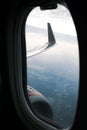 View from an airplane window outside at the wing Royalty Free Stock Photo