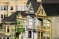 View on Alamo Square sign with detail of facades and exterior Painted Ladies architecture Royalty Free Stock Photo