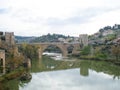 View of the Alcantara Bridge. The bridge of Alcantarais a Roman arch bridge in Toledo, Spain, spanning the Tagus River Royalty Free Stock Photo