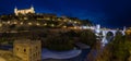 View of Alcantara bridge and the Alcazar of Toledo at night Spain Royalty Free Stock Photo