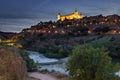 View of Alcantara bridge and the Alcazar of Toledo at night Spain Royalty Free Stock Photo