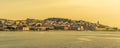 A view of the Alfama district of Lisbon, Portugal in the golden early morning light at sunrise