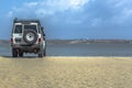 View of all terrain vehicle, standing on the beach overlooking the sea, Mussulo Island Royalty Free Stock Photo