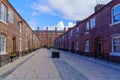 Alley with old red bricks buildings, Ancoats neighborhood, Manchester Royalty Free Stock Photo
