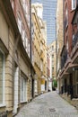 View along ancient Lovat Lane EC3 in City of London with sett pavement