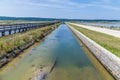 A view along channels feeding the concentration salt pans at Secovlje, near to Piran, Slovenia