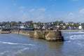 A view along the harbour wall in the village of Saundersfoot, Wales Royalty Free Stock Photo