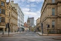 View along Leopold Street towards Sheffield Town Hall and clock tower in Sheffield, South Yorkshire, UK