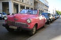 View along parked cars. Agramonte Street, Old Havana Royalty Free Stock Photo