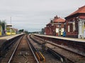 View along the platform at Hall Road Railway Station in Southport Merseyside