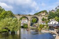 A view along the River Nidd towards the viaduct in the town of Knaresborough in Yorkshire, UK