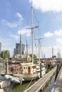 A view along the sailing boats in the Veerhaven on the imposing buildings on the Holland Amerikakade in Rotterdam 1