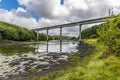 A view along the shore of Westfield Pill past the road bridge at Neyland, Pembrokeshire, South Wales Royalty Free Stock Photo